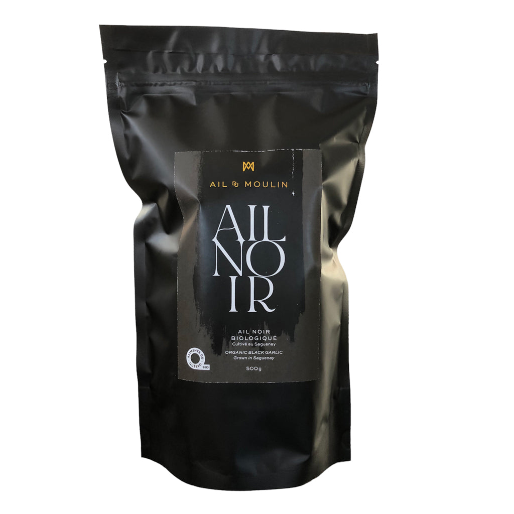 Ail noir biologique en format 500 g, texture moelleuse et saveur umami douce, issu de la réaction de Maillard, idéal pour cuisine gastronomique et transformation